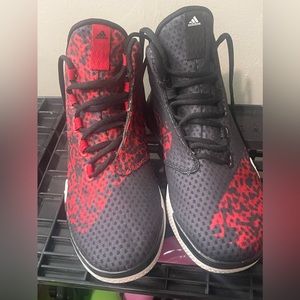 Men’s red and black Adidas sneakers